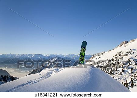 Snowboard in winter landscape View Large Photo Image Stock Image - Snowboard in winter landscape. Fotosearch