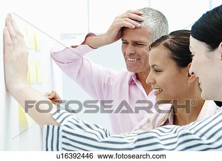 Team work on data View Large Photo Image Stock Photograph - Team work on data. Fotosearch
