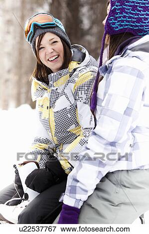 Teen girls in snowboard gear smiling View Large Photo Image Stock Photo - Teen girls in snowboard gear smiling. Fotosearch