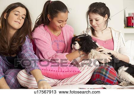 teenage girls having fun at home View Large Photo Image Stock Image - teenage girls having fun at home . Fotosearch