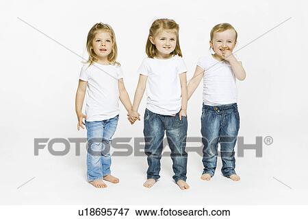 Three toddler girls holding hands View Large Photo Image Stock Photo - Three toddler girls holding hands. Fotosearch