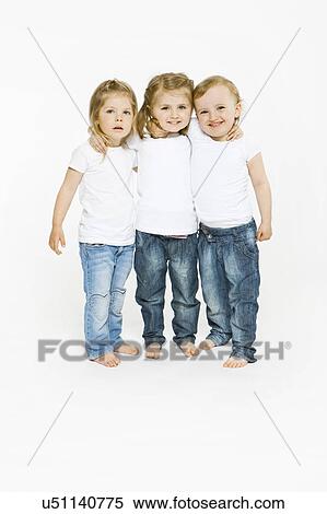 Three toddler girls hugging View Large Photo Image Stock Photography - Three toddler girls hugging. Fotosearch