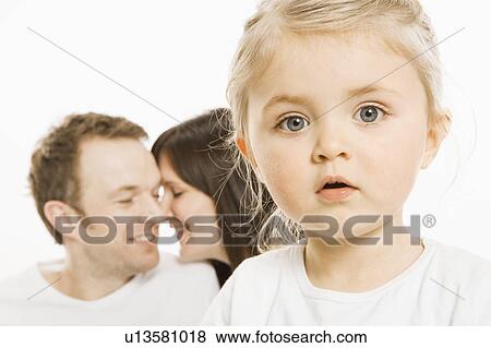 Toddler girl in front of parents View Large Photo Image Stock Photo - Toddler girl in front of parents. Fotosearch