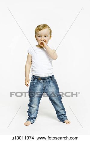 Toddler girl standing View Large Photo Image Picture - Toddler girl standing. Fotosearch
