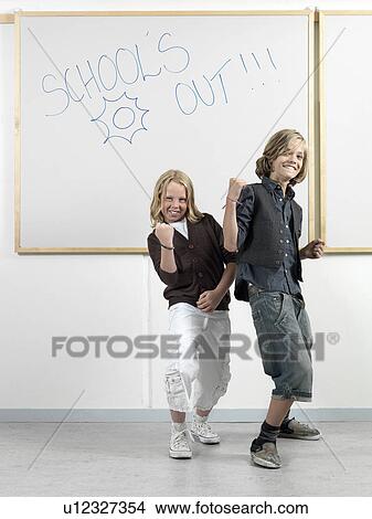 Two boys by the whiteboard View Large Photo Image Picture - Two boys by the whiteboard. Fotosearch