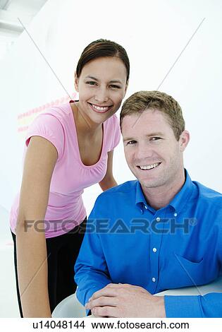 Picture - Two business people. Fotosearch