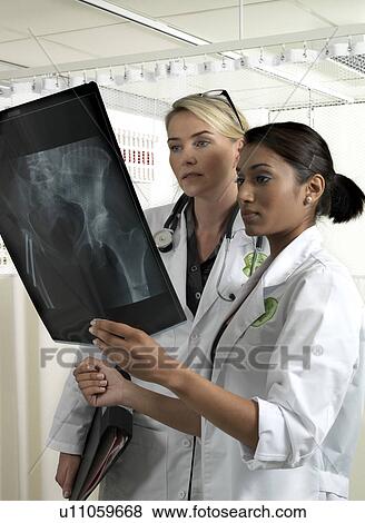 Stock Photo - Two doctors with x-ray. Fotosearch