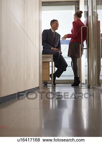 Two people in group Meeting in Office View Large Photo Image Stock Photo - Two people in group Meeting in Office. Fotosearch