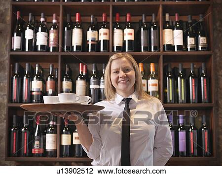 Waitress holding tray of coffee View Large Photo Image Stock Image - Waitress holding tray of coffee. Fotosearch