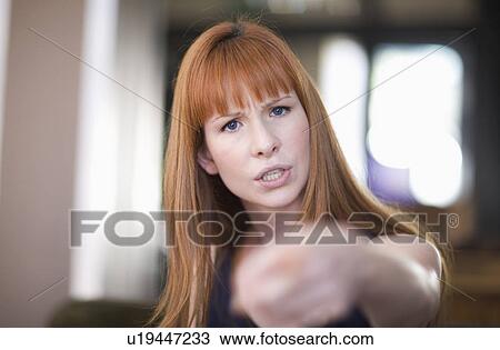 Stock Image - Woman argueing with somebody. Fotosearch