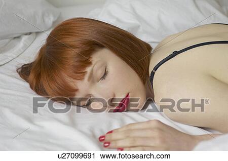 woman asleep in bed View Large Photo Image Stock Image - woman asleep in bed. Fotosearch
