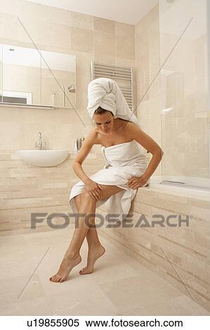 Woman at her toilette View Large Photo Image Stock Photography - Woman at her toilette. Fotosearch