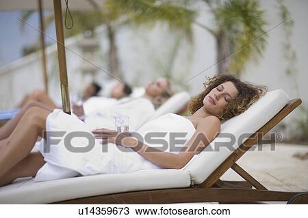 Woman at wellness farm View Large Photo Image Stock Image - Woman at wellness farm. Fotosearch