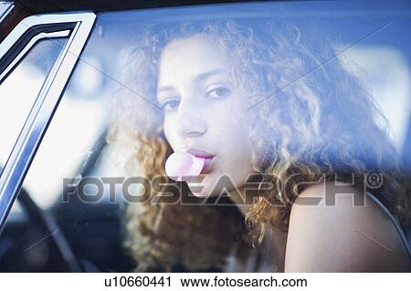 Woman chewing a gum View Large Photo Image Stock Image - Woman chewing a gum. Fotosearch