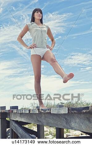 Stock Photo - Woman doing Yoga Pose. Fotosearch