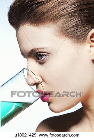 Woman drinking glass of water View Large Photo Image Stock Photo - Woman drinking glass of water. Fotosearch
