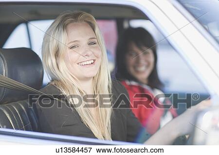 Stock Photo - Woman driving a car. Fotosearch