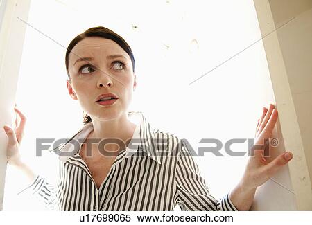 Stock Photography - Woman enters unknown area. Fotosearch