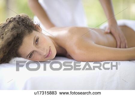 Woman having a massage View Large Photo Image Stock Image - Woman having a massage. Fotosearch