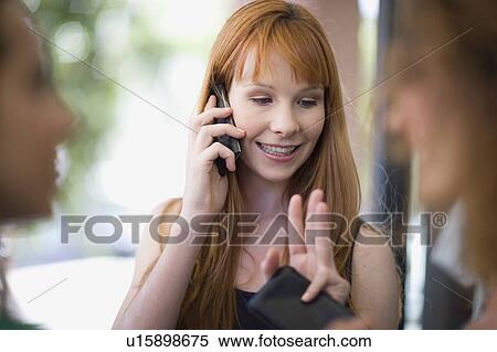 Stock Photography - Woman having a phone call. Fotosearch