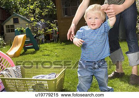 woman helping toddler to walk View Large Photo Image Stock Photography - woman helping toddler to walk. Fotosearch
