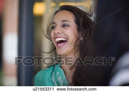 Stock Image - Woman laughing. Fotosearch
