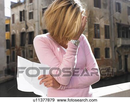 Woman reading a letter View Large Photo Image Stock Photo - Woman reading a letter. Fotosearch