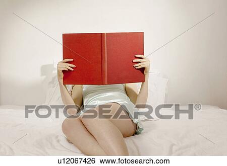 woman reading book in bed View Large Photo Image Stock Photograph - woman reading book in bed. Fotosearch