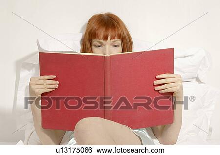 woman reading book in bed View Large Photo Image Stock Photograph - woman reading book in bed. Fotosearch