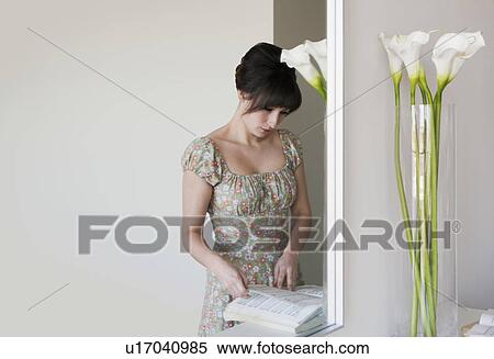 Woman reading music book View Large Photo Image Stock Photography - Woman reading music book. Fotosearch