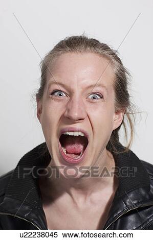 Stock Photography - Woman screaming. Fotosearch