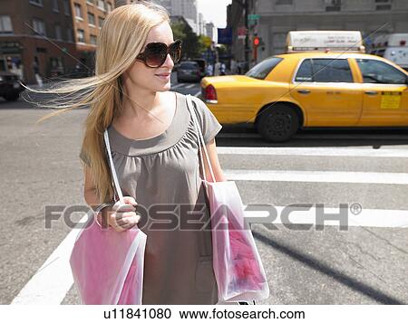 Woman shopping in New-York City View Large Photo Image Stock Image - Woman shopping in New-York City. Fotosearch