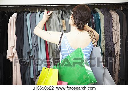 Woman shopping View Large Photo Image Stock Image - Woman shopping. Fotosearch