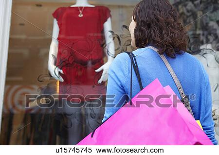 Stock Photography - Woman Shopping. Fotosearch
