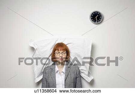 Picture - woman standing up asleep. Fotosearch