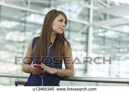 Woman with cellphone View Large Photo Image Stock Image - Woman with cellphone. Fotosearch