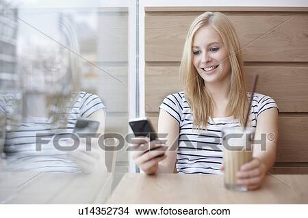 Woman with coffee View Large Photo Image Picture - Woman with coffee. Fotosearch