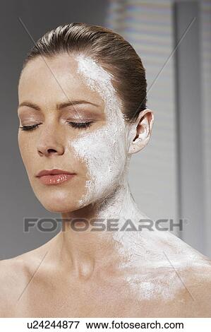 Woman with moisturizer on face and neck View Large Photo Image Stock Photo - Woman with moisturizer on face and neck. Fotosearch