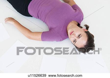 Woman with papers View Large Photo Image Stock Photo - Woman with papers. Fotosearch