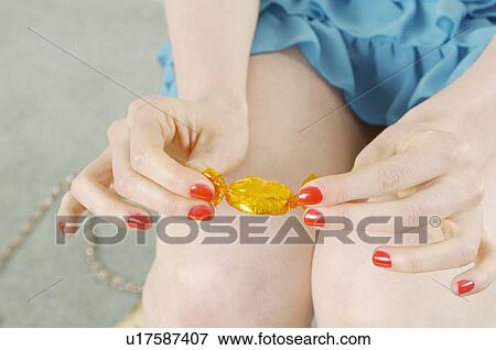 Stock Photo - woman with sweet. Fotosearch