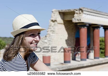 womansmiling in front of temple View Large Photo Image Stock Image - womansmiling in front of temple . Fotosearch