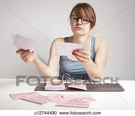Women doing Paperwork View Large Photo Image Stock Image - Women doing Paperwork. Fotosearch