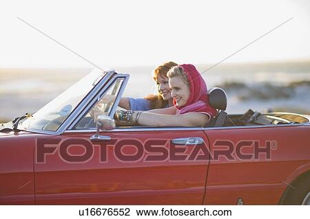 Stock Image - Women driving. Fotosearch