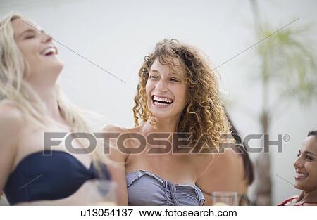 Stock Photo - Women having fun in spa. Fotosearch