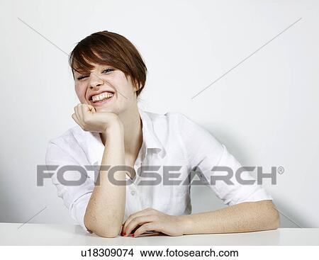 Women in white shirt laughing View Large Photo Image Picture - Women in white shirt laughing. Fotosearch