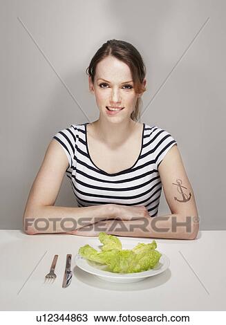 Women with Anchor Tatoo with Salad Plate View Large Photo Image Stock Image - Women with Anchor Tatoo with Salad Plate. Fotosearch