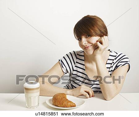 Women with Croissant and Coffe View Large Photo Image Stock Image - Women with Croissant and Coffe. Fotosearch