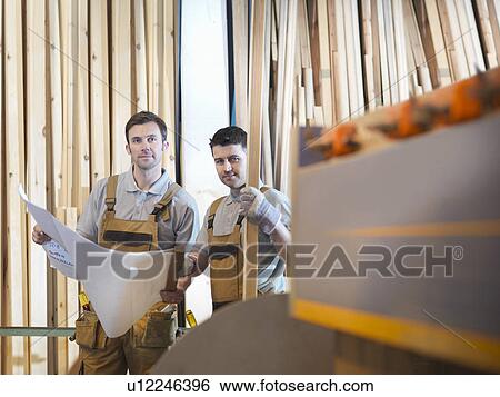 Stock Photograph - Woodworkers with timber. Fotosearch