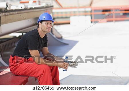 Stock Photography - Worker having a rest. Fotosearch
