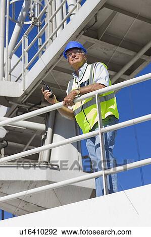 Worker in a harbour View Large Photo Image Stock Image - Worker in a harbour. Fotosearch